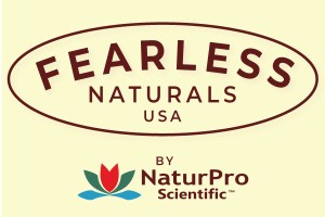 A serene forest scene with sunlight filtering through trees and wildflowers in bloom, featuring an elderly man crafting herbal remedies.